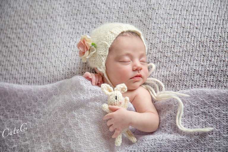 newborn on purple