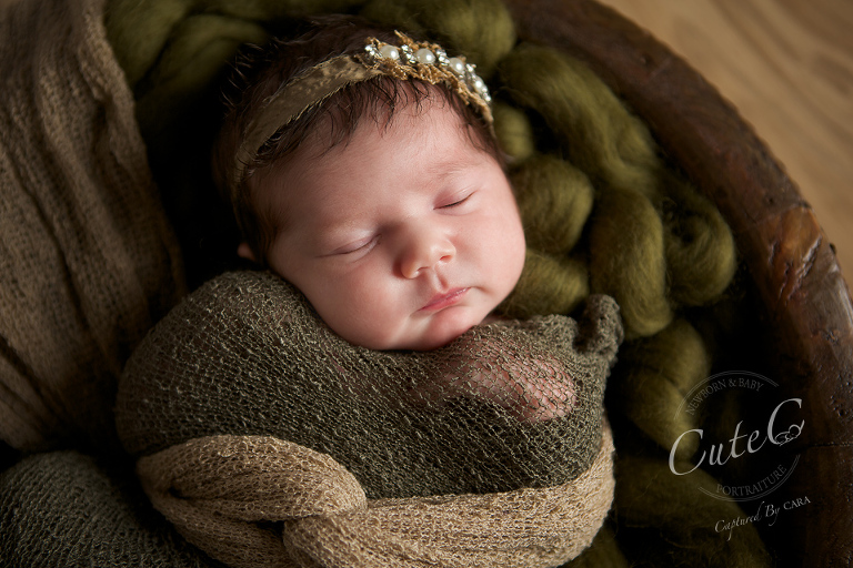 newborn with crystal headband