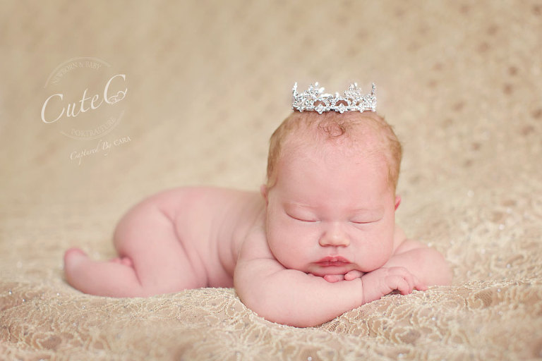 newborn in crown